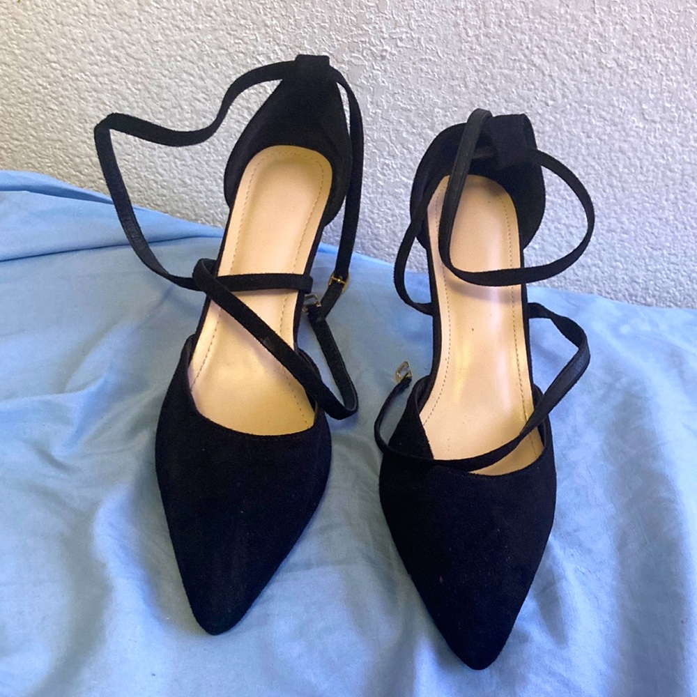 They are black high short heels, hardly worn.